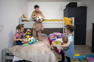 Damien’s daughters playing on the beds they received from Home Start Uk’s corporate partner HappyBeds on the 22nd of January 2022 in the Medway region of Kent. The family are currently living in temporary accommodation and have been receiving support from HomeStart Medway. (photo by Andy Aitchison / HomeStart UK)