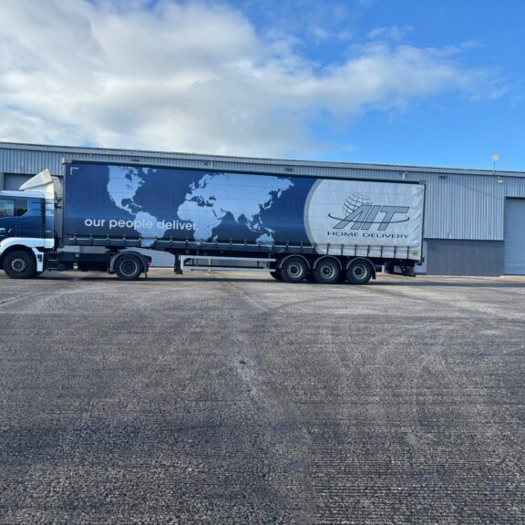 AIT Home Delivery lorry in front of the new depot in County Antrim Northern Ireland